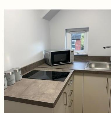Shared kitchenette with hob and microwave